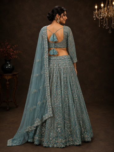 Aqua Blue Silk Designer Lehenga Choli with Heavy Silver Embroidery & Net Dupatta