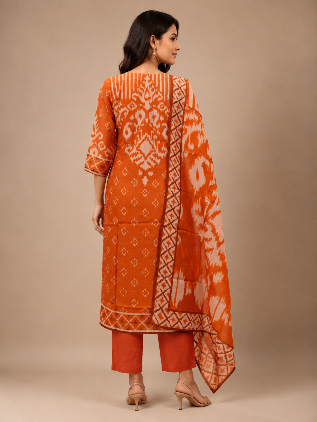Orange Printed Silk Kurta Set with Ikat Dupatta