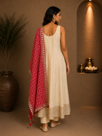 Cream Silk Designer Suit with Pink Embroidered Dupatta
