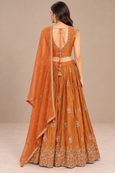 Burnt Orange Silk Embroidered Lehenga Set with Net Dupatta