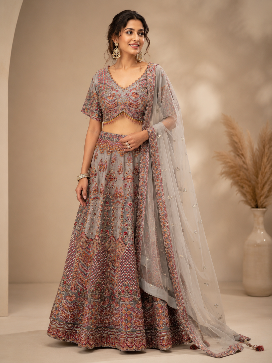 Grey Silk Designer Lehenga Choli with Heavy Traditional Embroidery & Net Dupatta