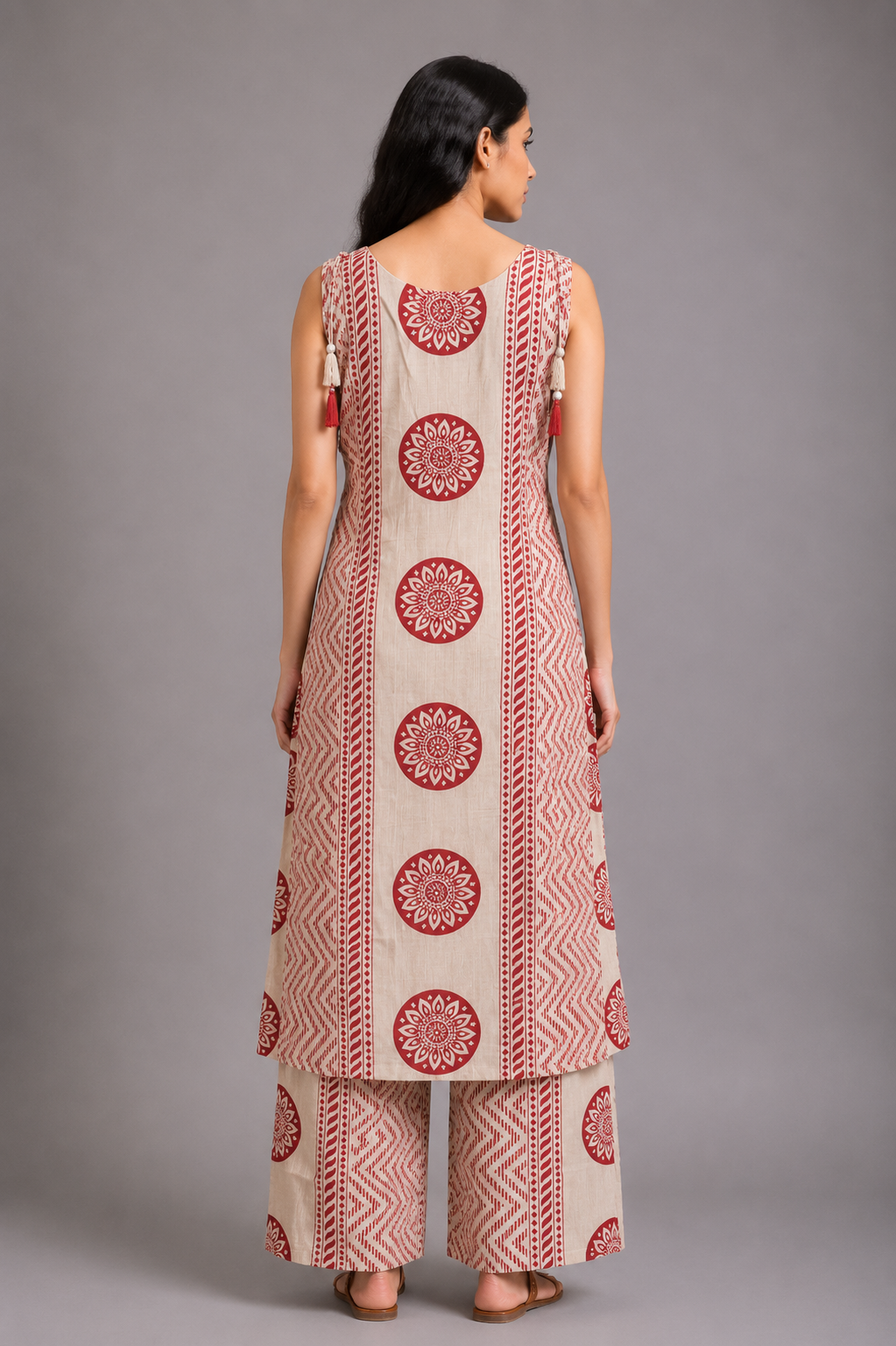 Beige and pink Printed Kurta Palazzo Set with Tassel Detailing